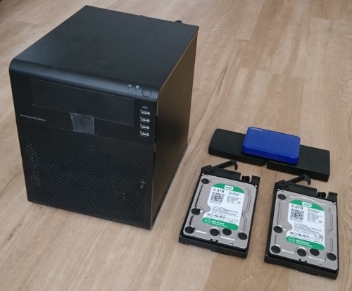 Photograph of HP MicroServer and hard drives